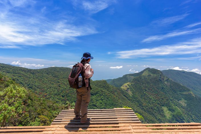 Hiker Relaxing At Worlds End Horton Planes Sri Lanka